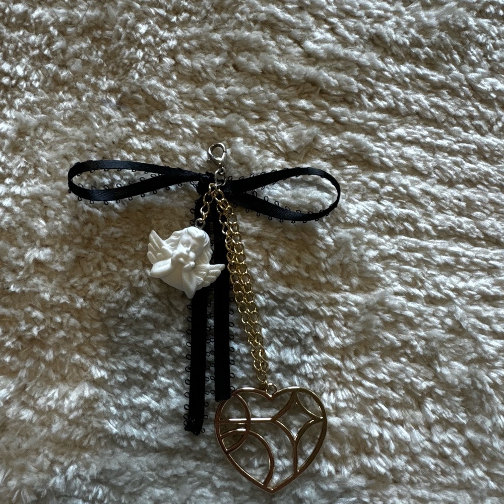 Coquette bow angel bag charm
